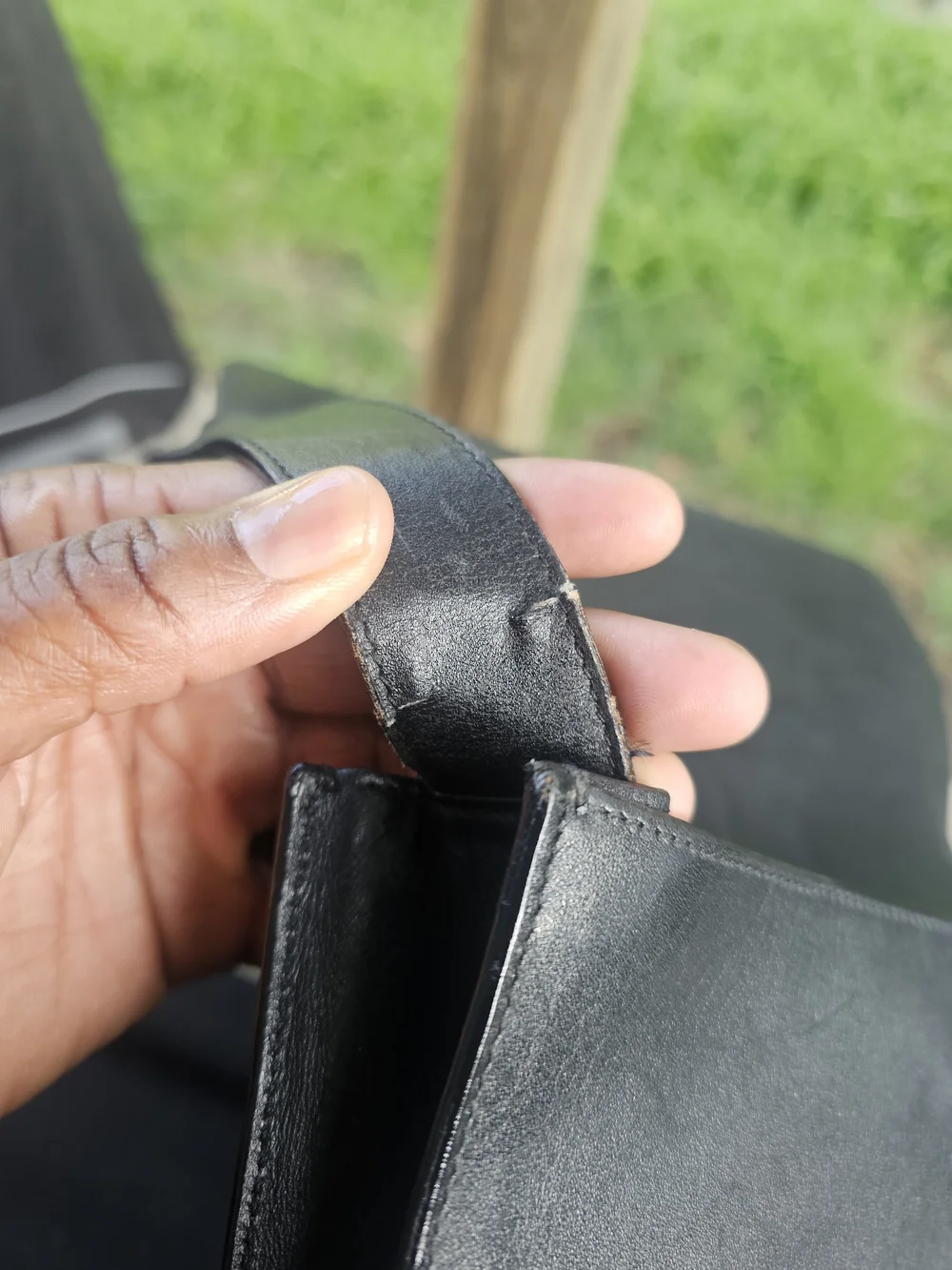 Black Leather Shoulder Bag with Gold Accent